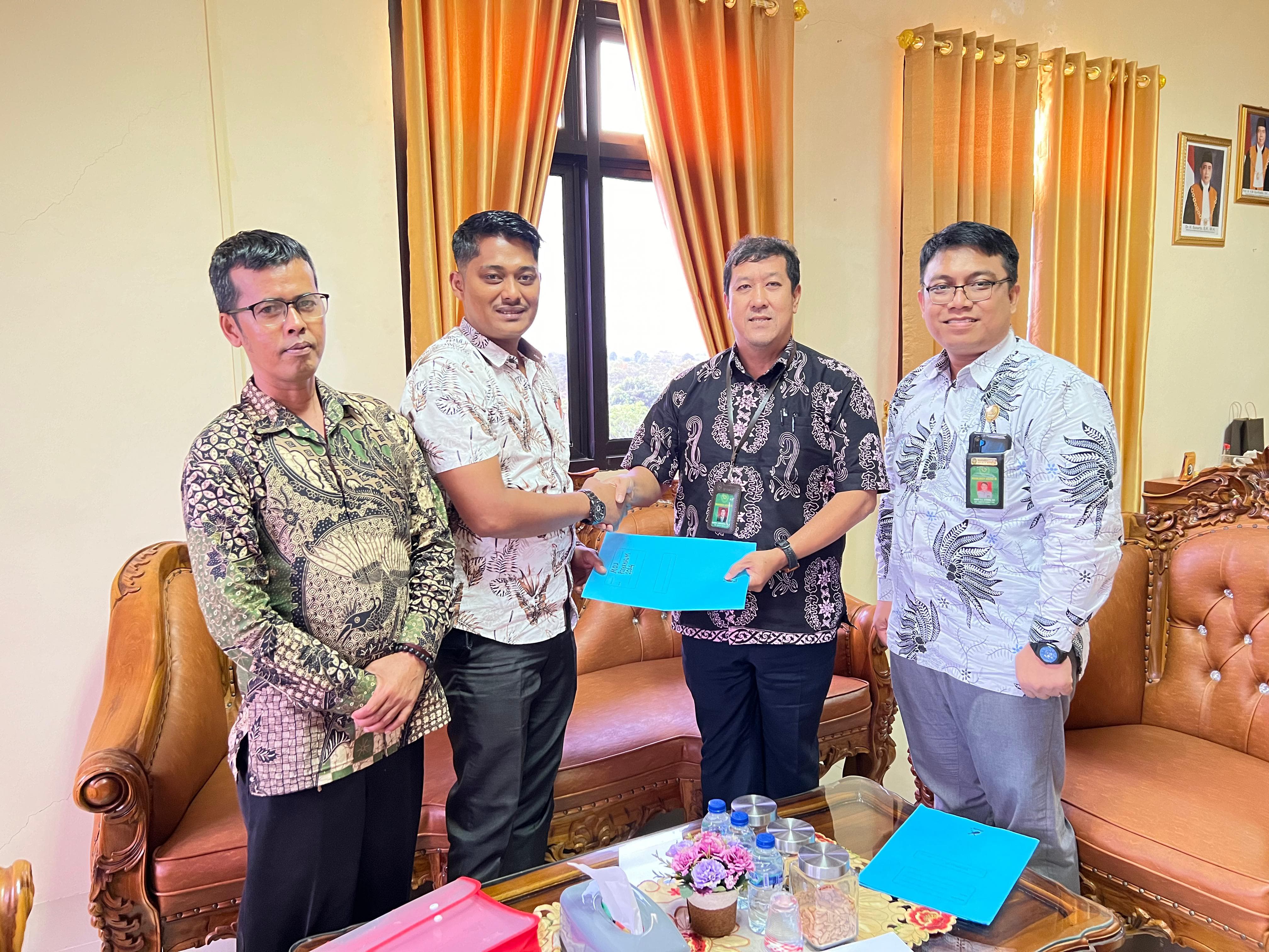 Penandatanganan MoU POSBAKUM